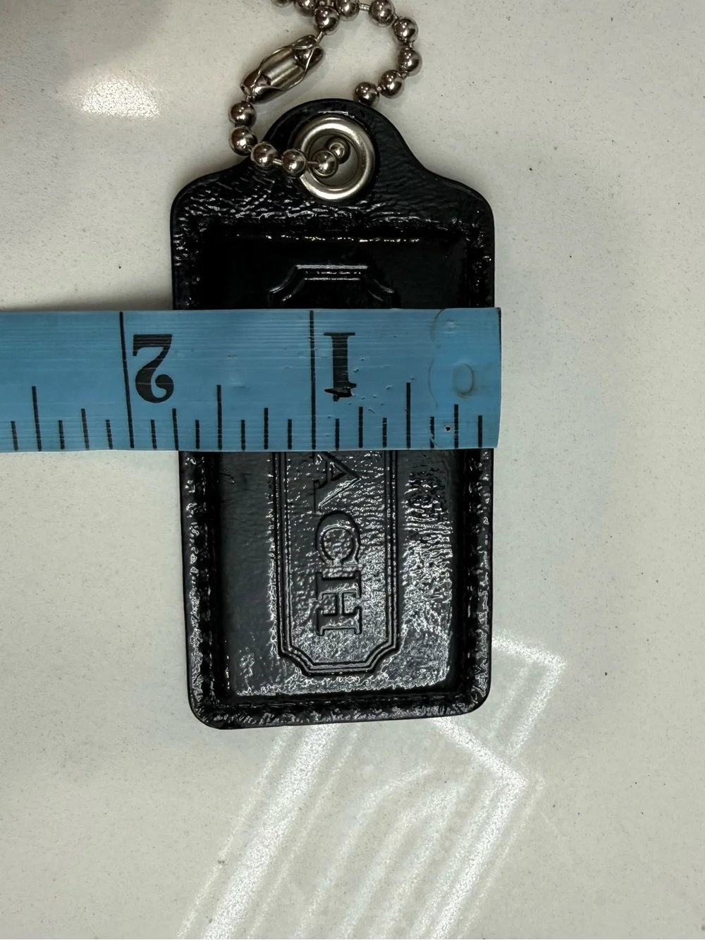 Coach key tag